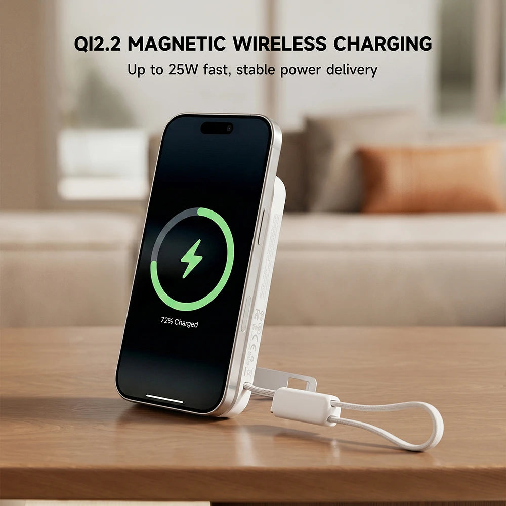 MagAir magnetic wireless power bank charging a smartphone on a wooden surface with Qi2.2 magnetic wireless charging technology. #color_white