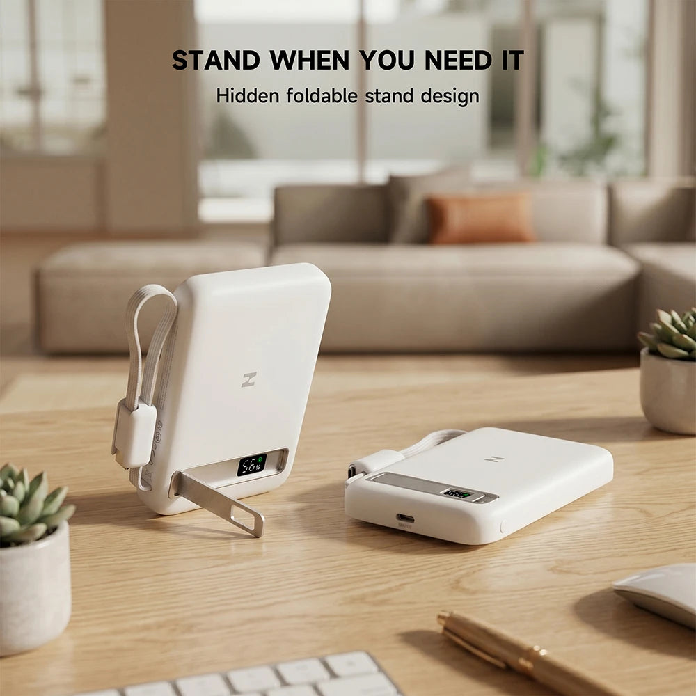MagAir white magnetic power bank with a hidden foldable stand on a wooden surface in a modern living room. #color_white