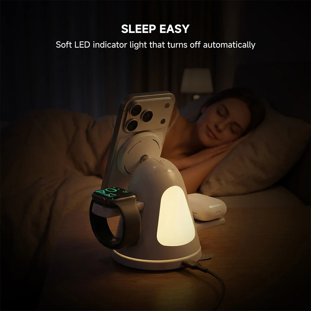 ZEEHOO LuminoCore gray 4-in-1 wireless charging station on a bedside table charging smartphone and smartwatch, with soft LED indicator light for nighttime use. #color_gray