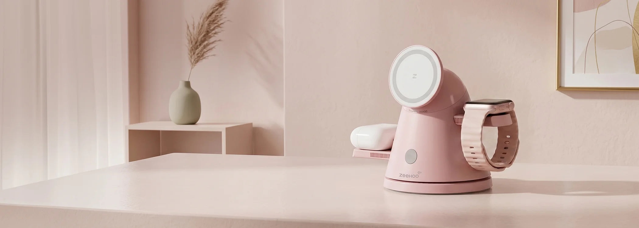 Pink kitchen appliance placed on a desk, featuring a pink 4-in-1 LuminoCore on a light pink surface with a minimal background.