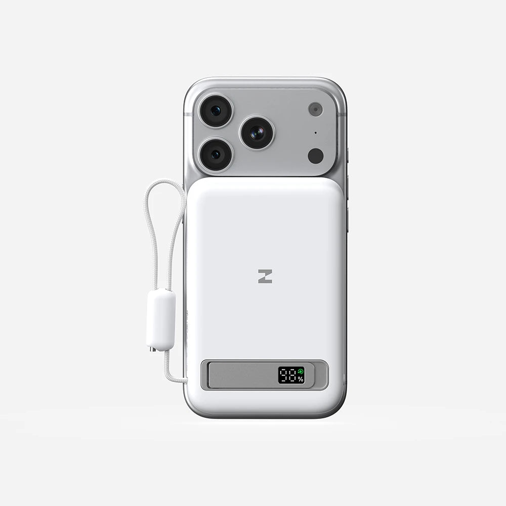 Smartphone with a MagAir magnetic power bank attached on a light gray background. #color_white