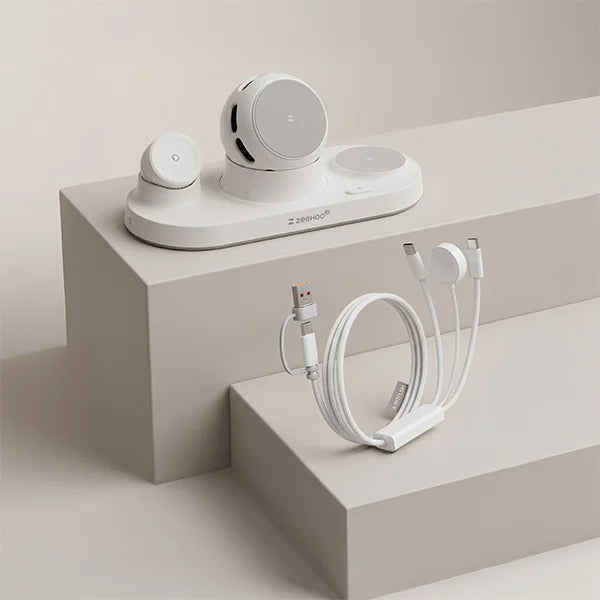 White ZEEHOO 3-in-1 wireless charging cable and 3-in-1 desktop wireless charging station on a light gray surface.