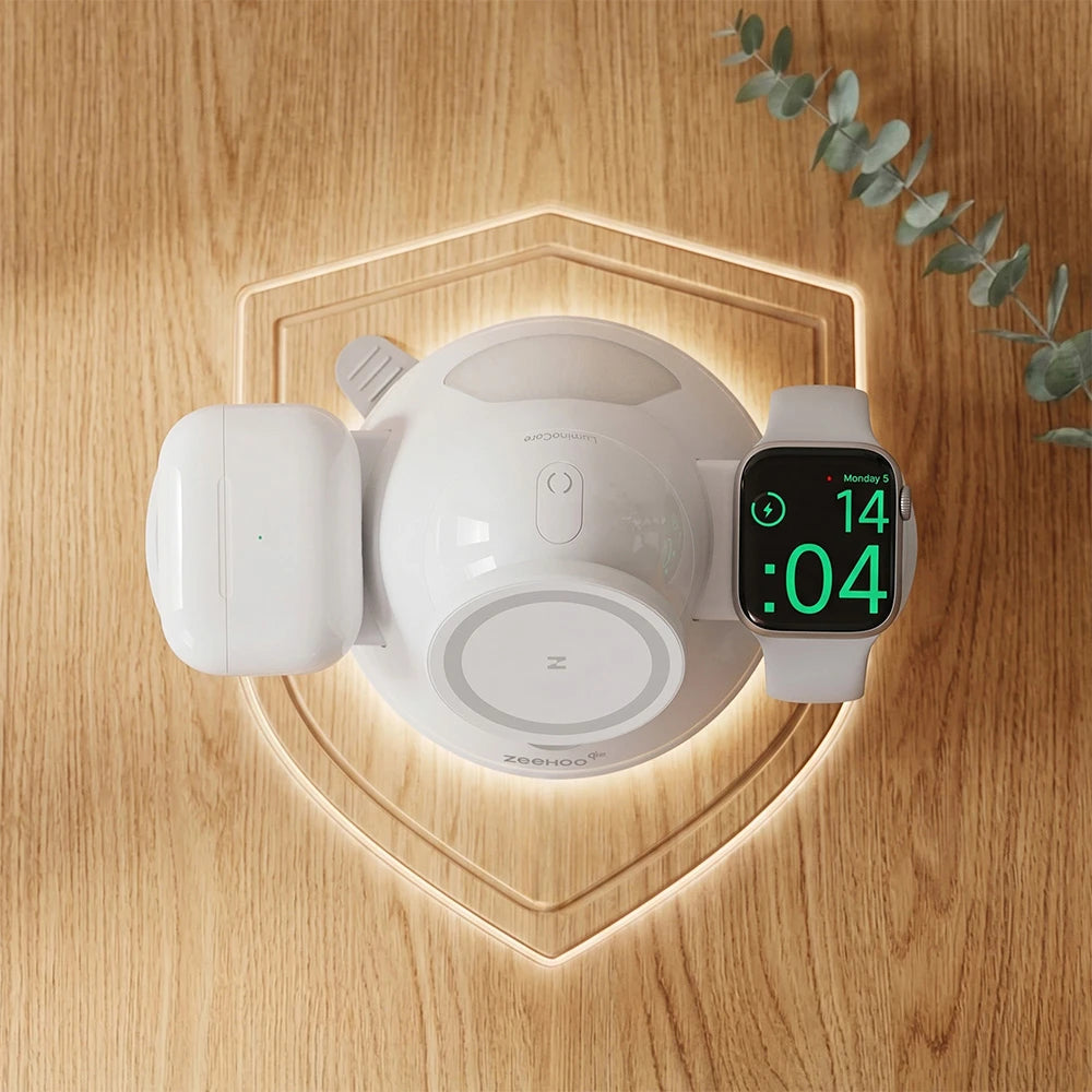 ZEEHOO LuminoCore wireless charging stand with a smartwatch on a wooden surface and a decorative plant, featuring built-in protection against overcharging, overheating, and overcurrent, backed by reliable warranty support.